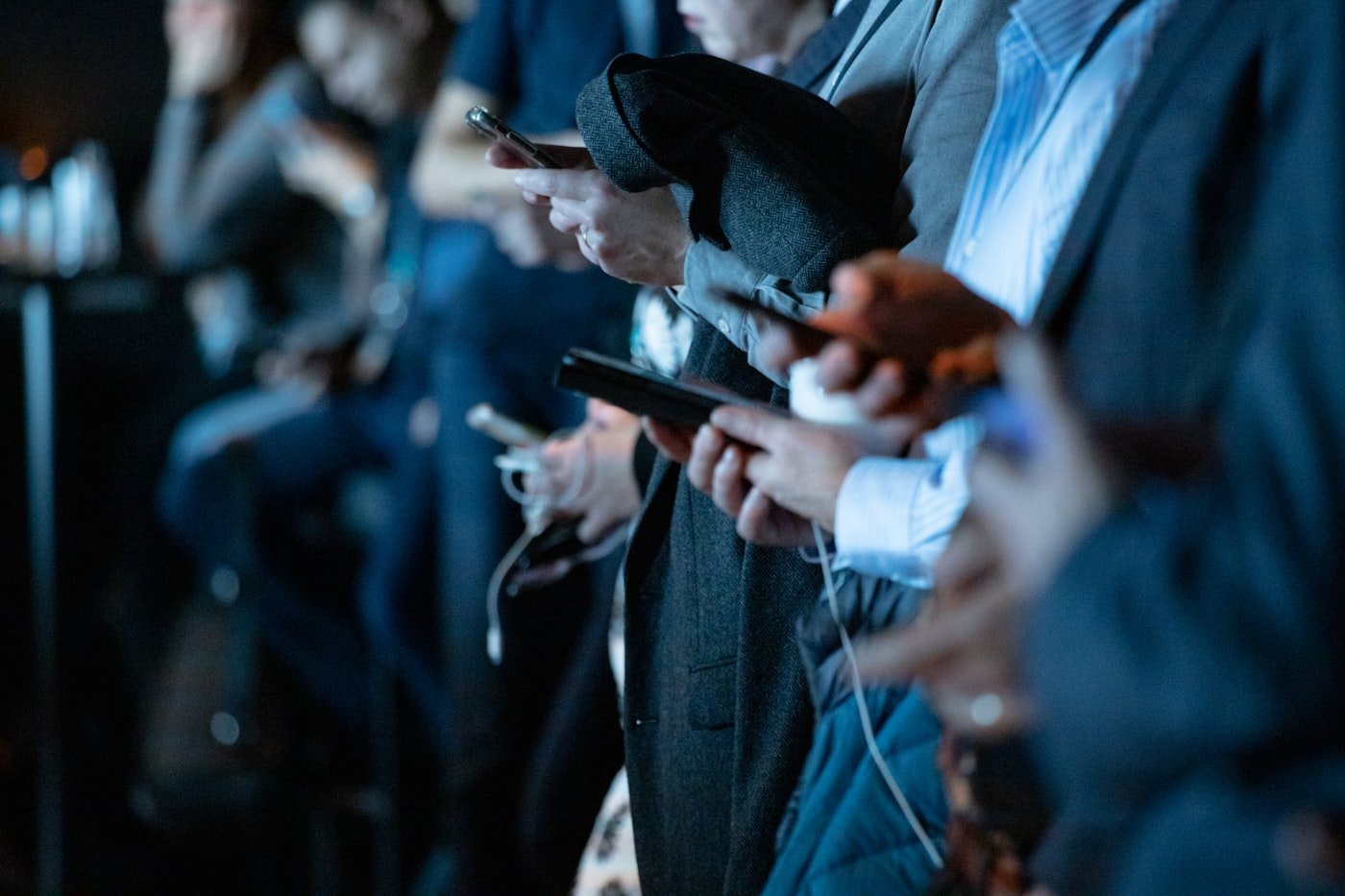 Person checking digital information on a smartphone to verify online content